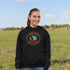 Celebrate the heart of the prairies with our Manitoba – Wild & Free hoodie, featuring a stunning graphic of a Canadian goose soaring over golden wheat fields.